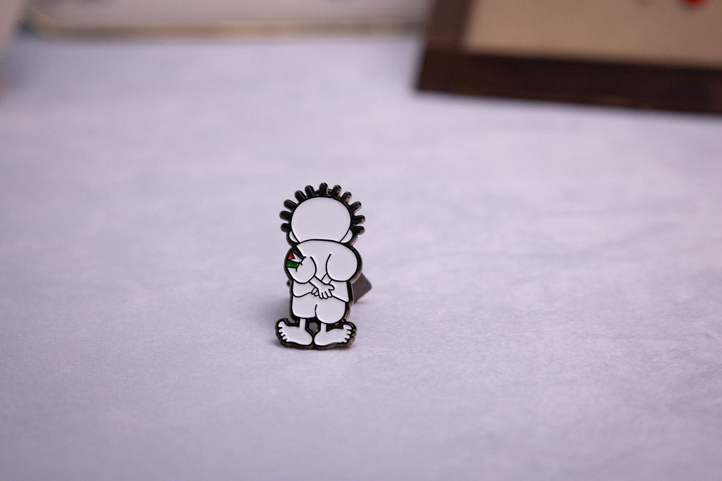 Handala Enamel Art Pin — studio photograph