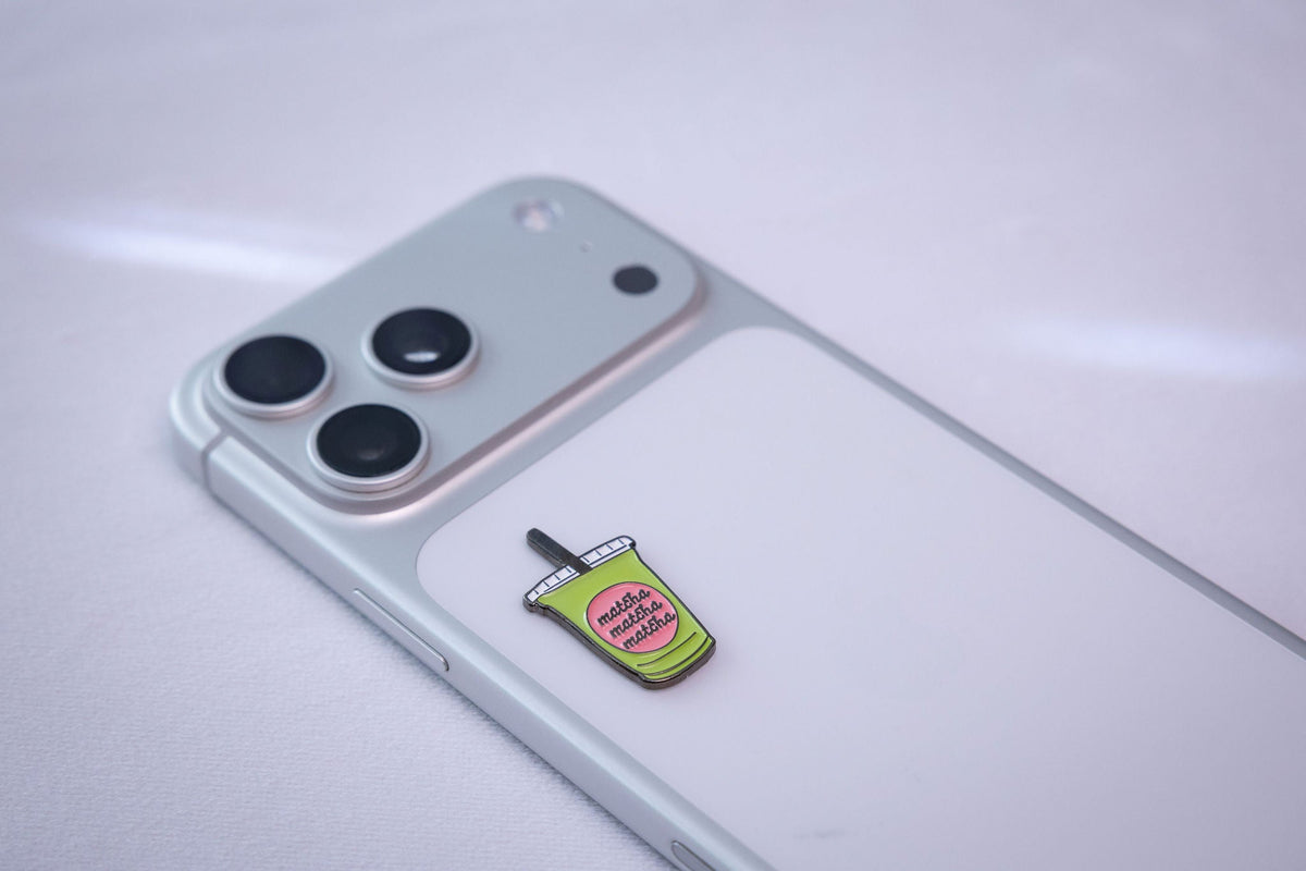 The matcha matcha matcha sticker on the back of a phone case.