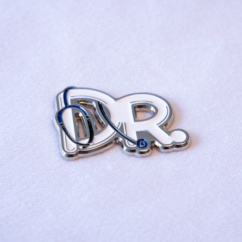 DR. in white block letters with a navy stethoscope threaded through the D.