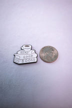 The Read Good Books sticker beside a US quarter for scale.