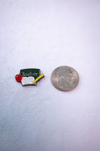 The Teacher Appreciation sticker beside a US quarter for scale.