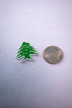 The Lebanon Cedar sticker beside a US quarter for scale.