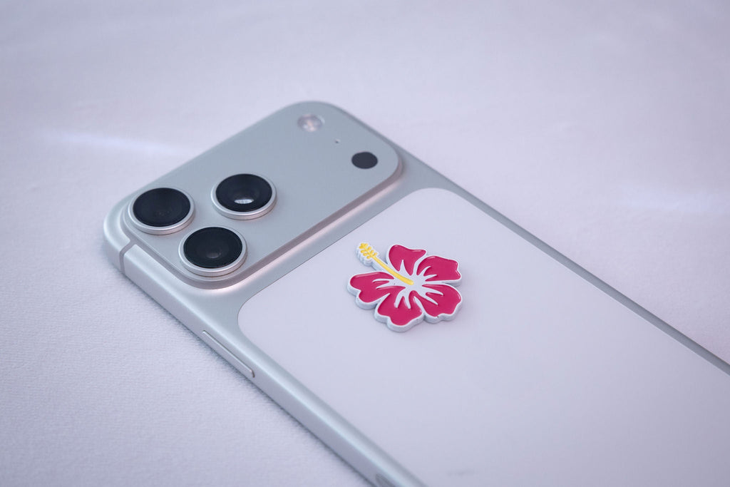 Hibiscus Flower sticker, applied to a phone case near the camera bump
