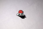 The outline of Iraq filled with the national flag, red, white and black, with الله أكبر in green Kufic across the white band, as a metal sticker.